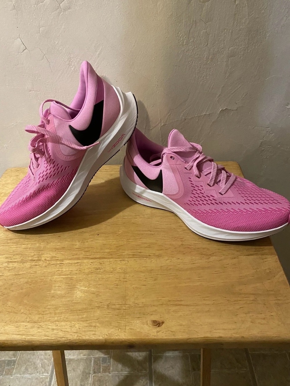 Nike Women’s Pink Athletic Running Shoes with Black Swoosh